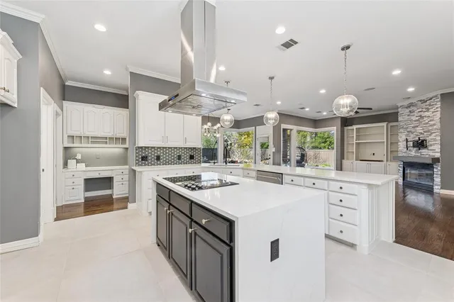 a view of a livingroom with wooden floor and a table