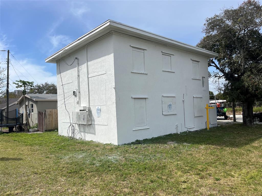 614 North Tamarind Avenue West Palm Beach, FL 33401 - Photo 2 of 5 a view of a house with a yard