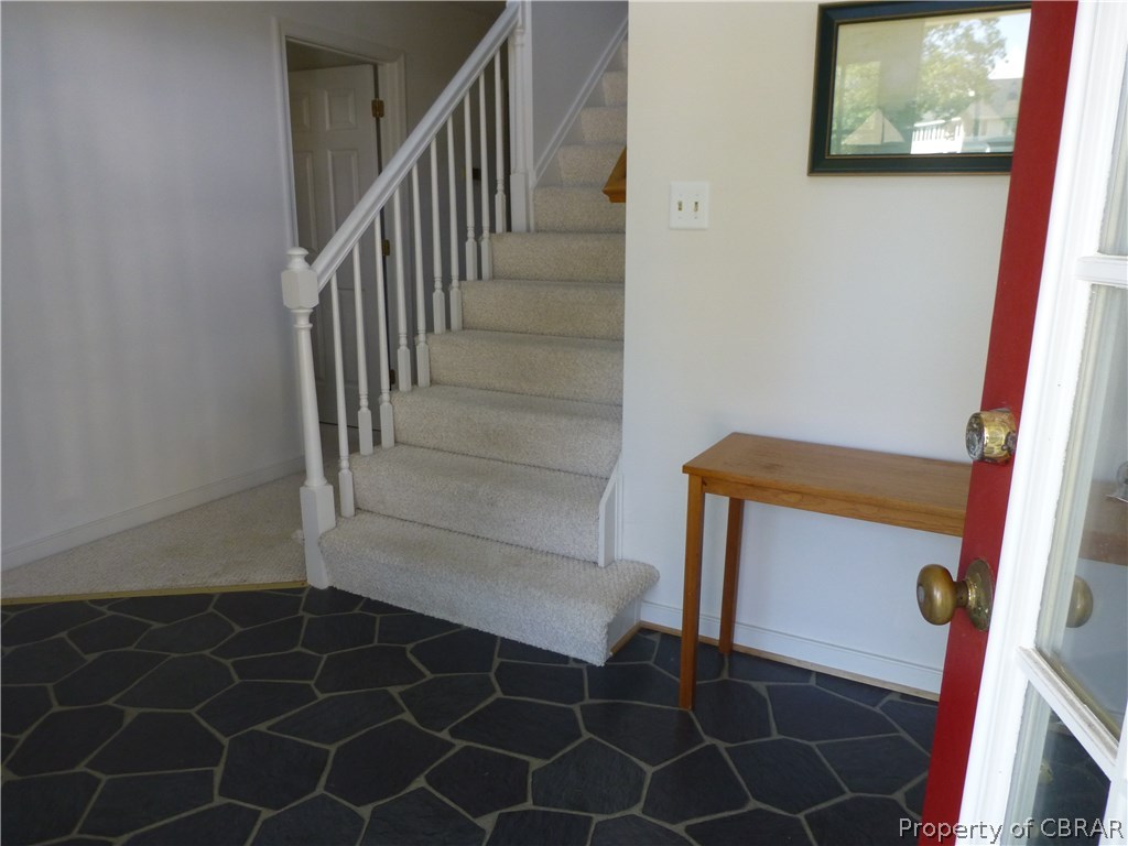 464 Jackson Creek Road Deltaville, VA 23043 - Photo 17 of 26 Entrance foyer - bedrooms on first floor, living space on second!
