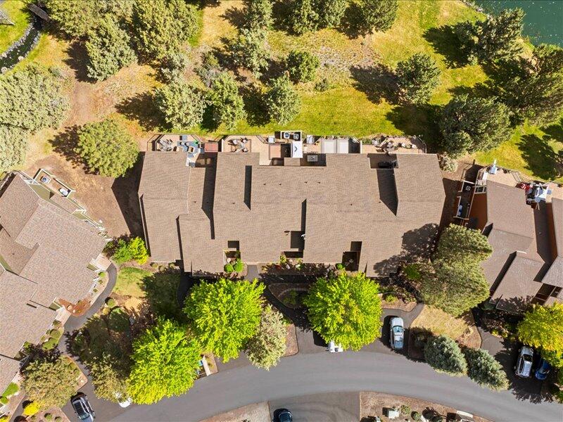 1378 Highland View Loop Redmond, OR 97756 - Photo 61 of 98 an aerial view of a house with a yard and a large tree