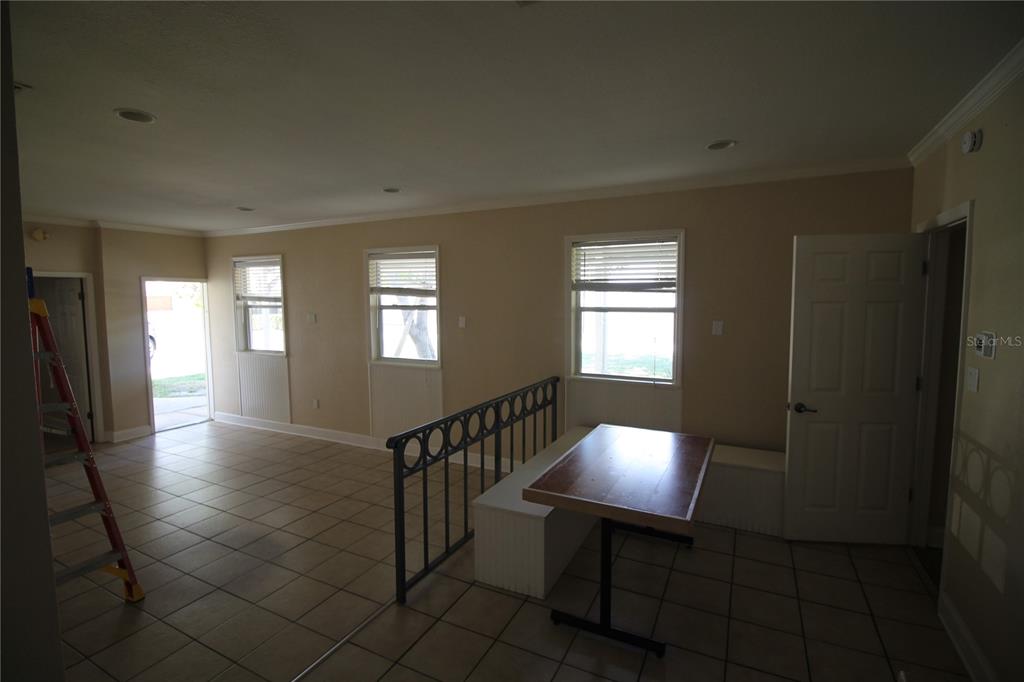 4820 Lake Gibson Park Road, Unit 3 Lakeland, FL 33809 - Photo 7 of 13 a view of entryway and hall with a window