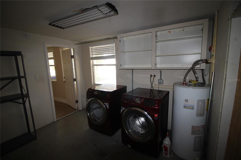 4820 Lake Gibson Park Road, Unit 3 Lakeland, FL 33809 - Photo 8 of 13 a utility room with dryer and washer
