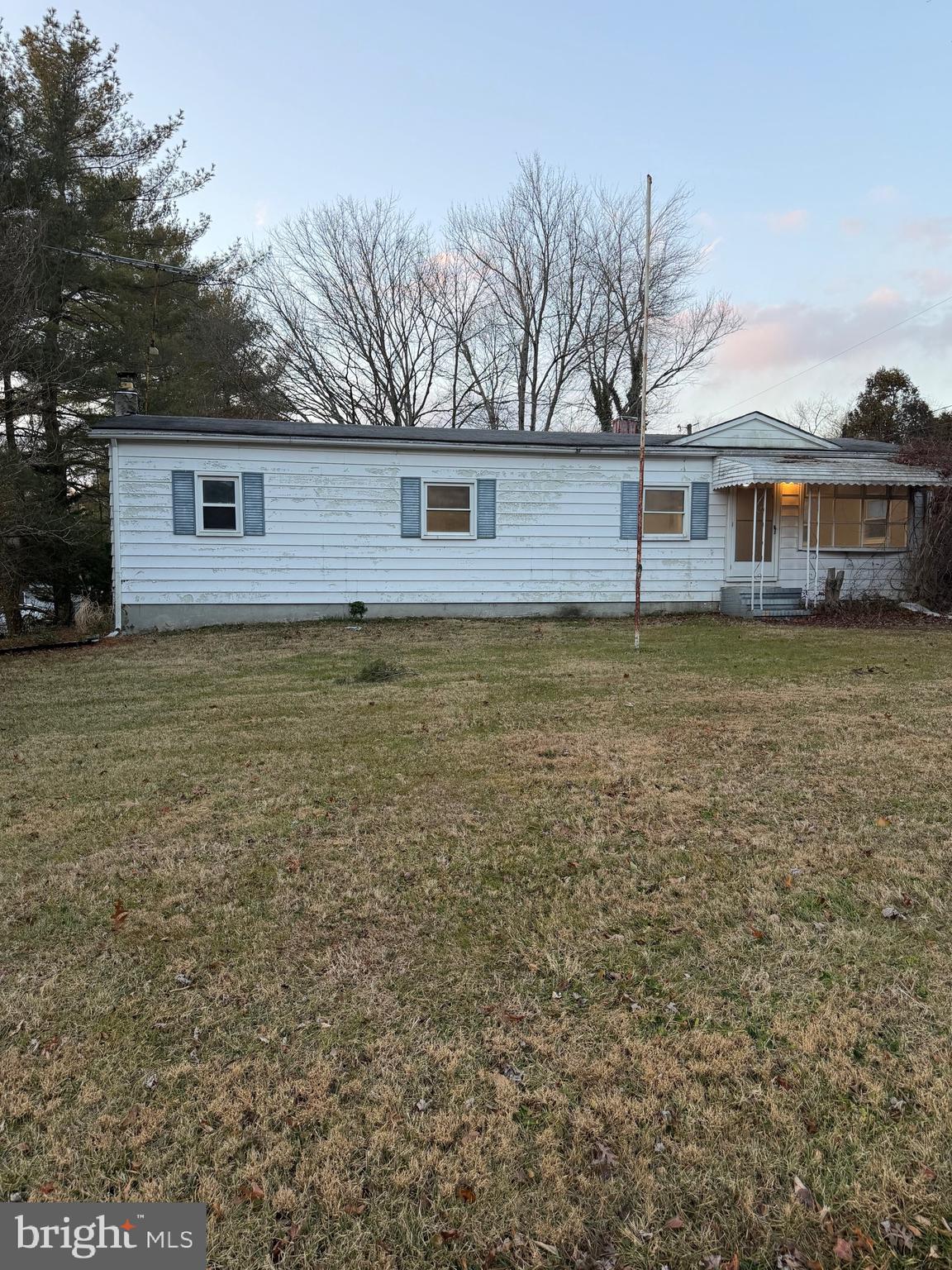 a front view of a house with yard
