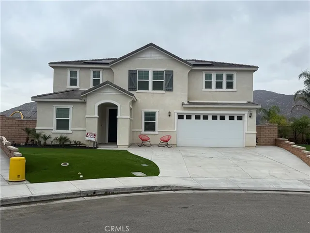 a house view with a outdoor space