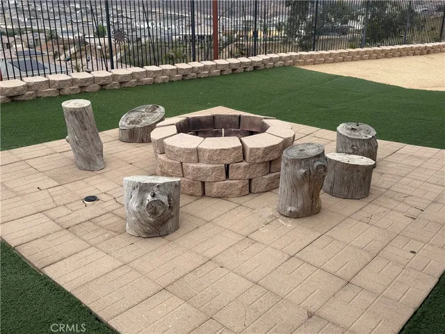 a view of a swimming pool with a patio