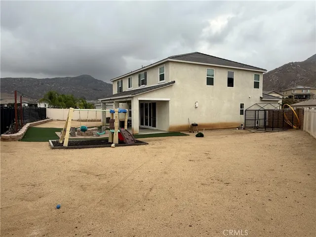 a view of a house with a patio