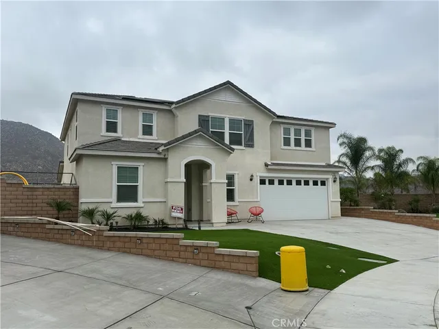 a front view of house with yard and seating