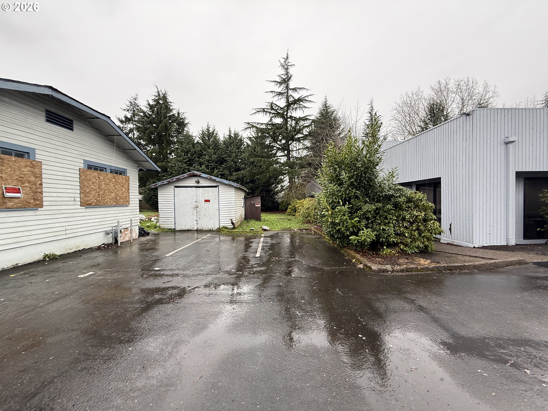 3945 Southwest 185th Avenue Beaverton, OR 97078 - Photo 1 of 26 a view of a small space in front of a house