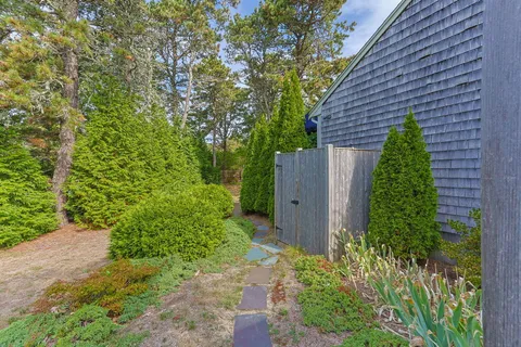 a backyard of a house with lots of green space