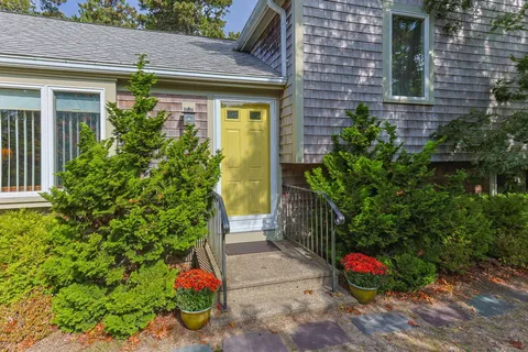 a view of a back yard of the house