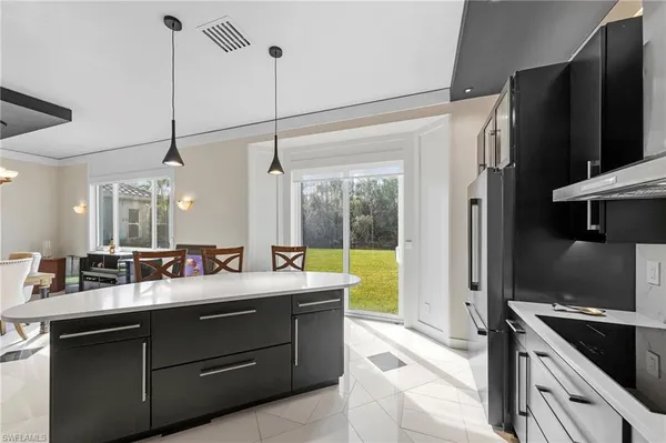 a bathroom with a double vanity sink a mirror and shower