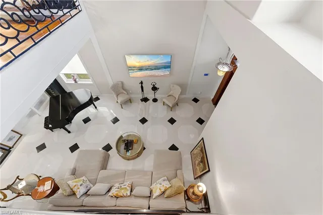 a view of living room with furniture and rug