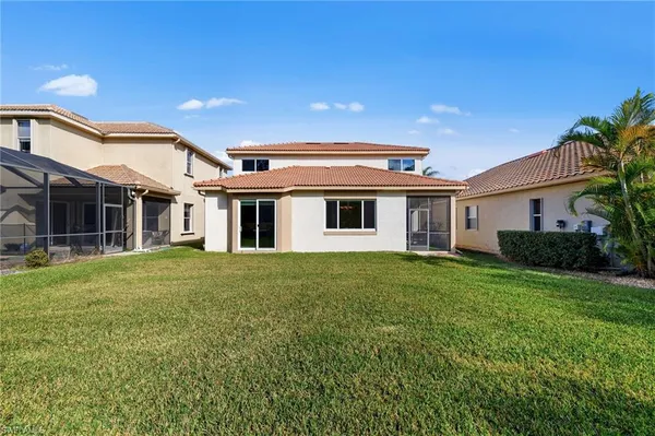 front view of a house and a yard