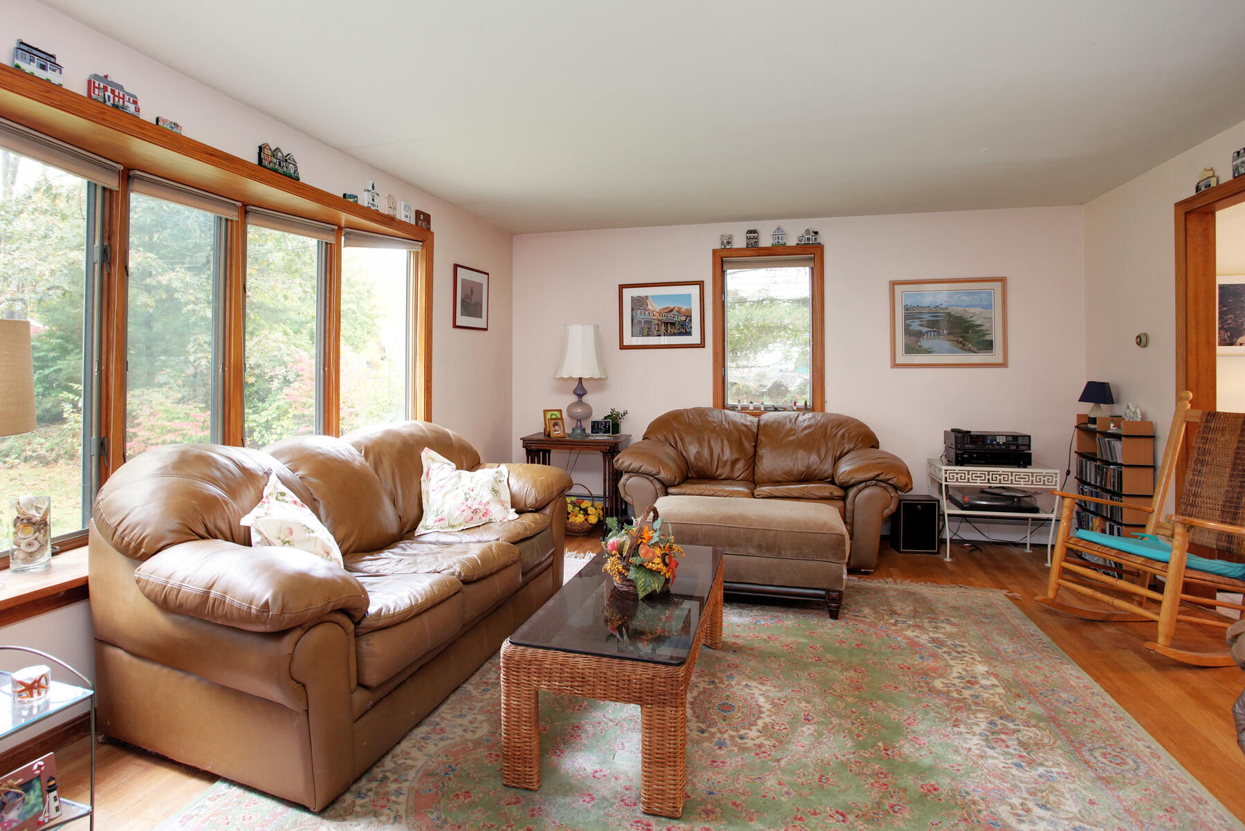 62 Pine Ridge Road Cotuit, MA 02635 - Photo 1 of 31 a living room with furniture and large windows