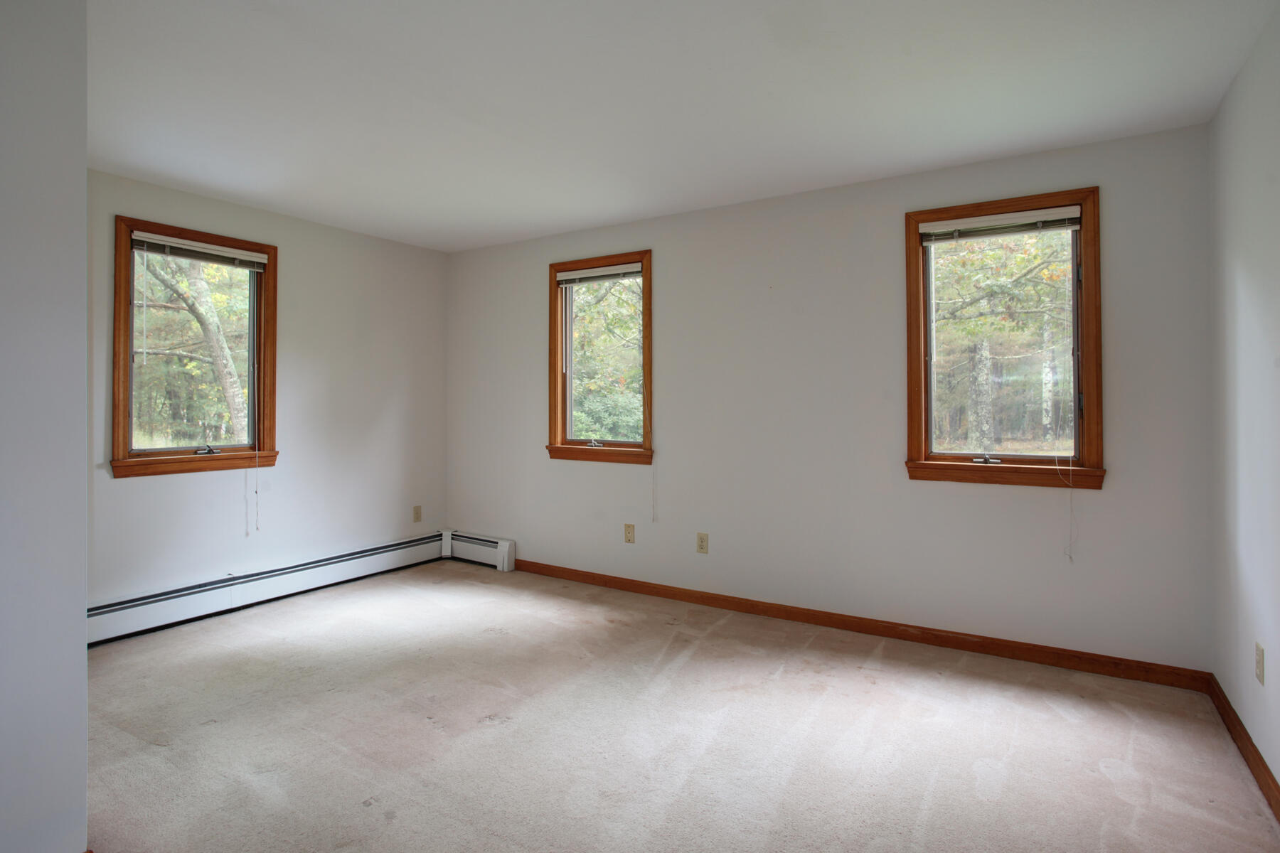 62 Pine Ridge Road Cotuit, MA 02635 - Photo 12 of 31 a view of an empty room with a window