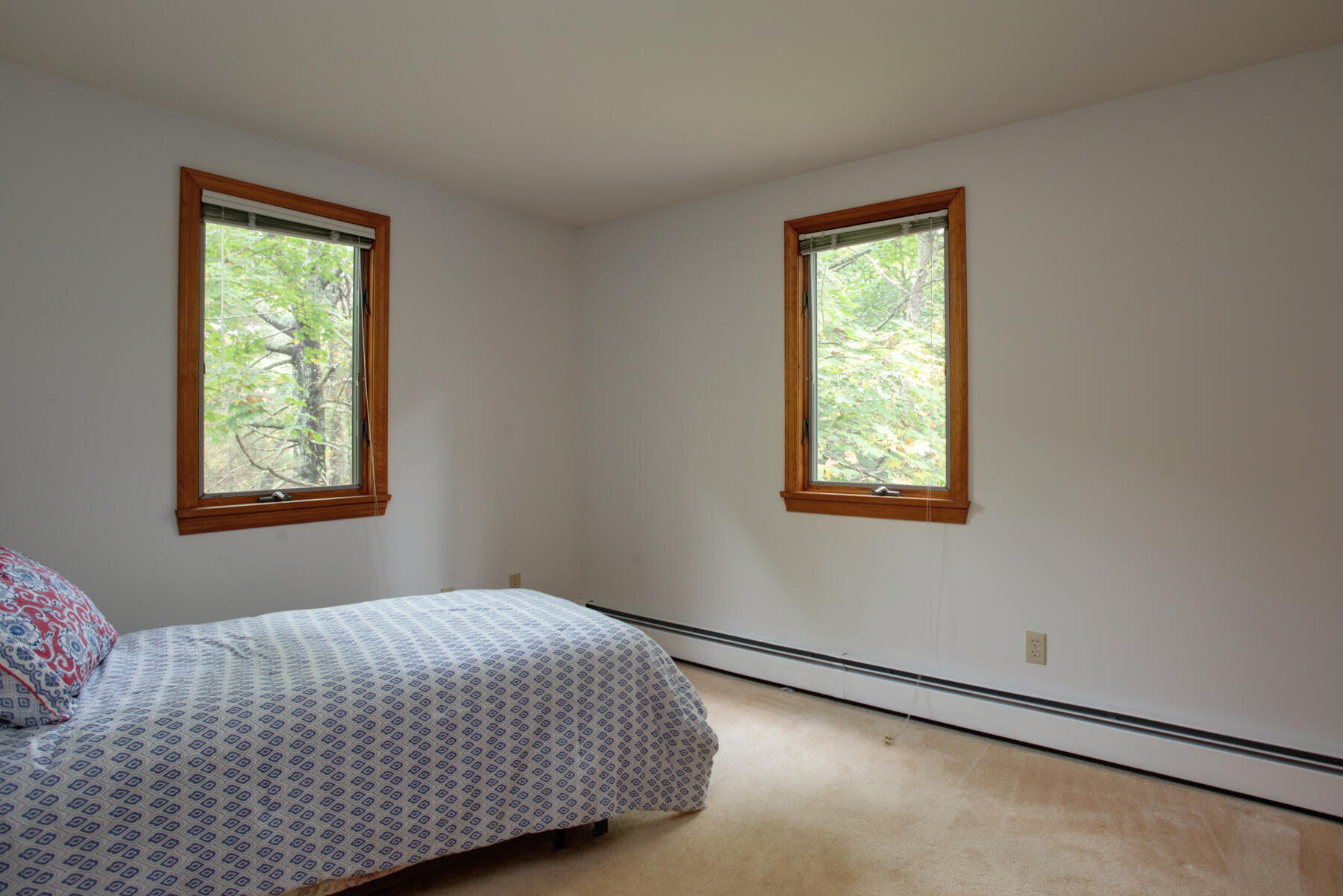 62 Pine Ridge Road Cotuit, MA 02635 - Photo 13 of 31 a bedroom with a bed and a window