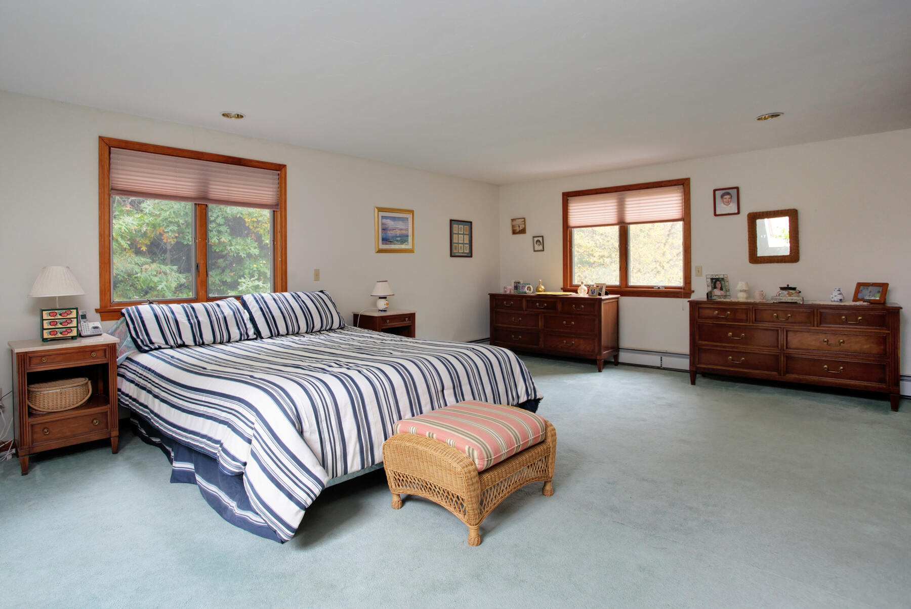 62 Pine Ridge Road Cotuit, MA 02635 - Photo 18 of 31 a spacious bedroom with a bed and window