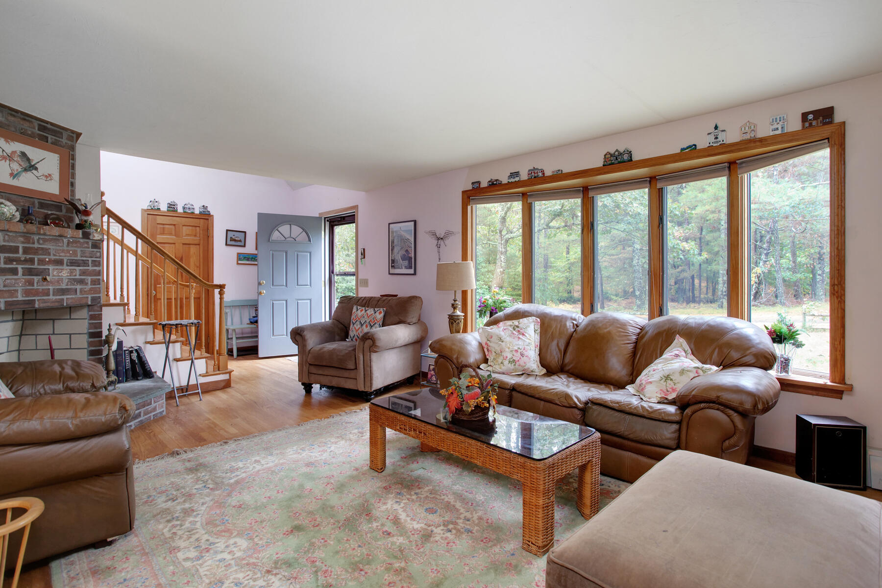 62 Pine Ridge Road Cotuit, MA 02635 - Photo 22 of 31 a living room with furniture and a large window