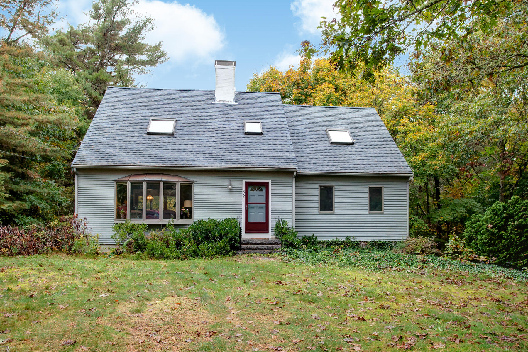 62 Pine Ridge Road Cotuit, MA 02635 - Photo 25 of 31 front view of house with a yard