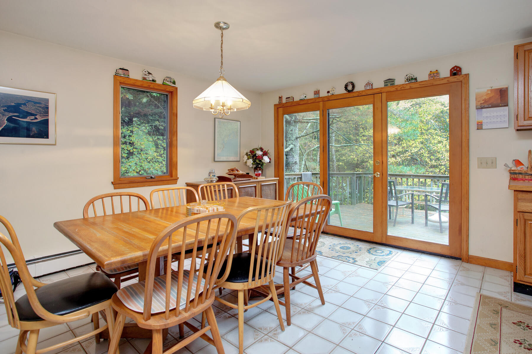 62 Pine Ridge Road Cotuit, MA 02635 - Photo 5 of 31 a view of a dining room with furniture window and outside view