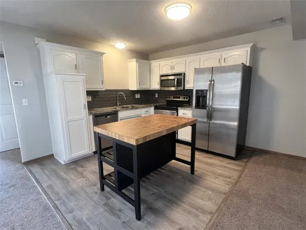 $225,000 | 1611 Southwest Highland Drive, Lee's Summit, MO 64081