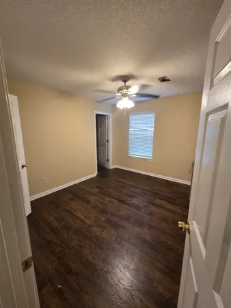 a view of a livingroom with a staircase