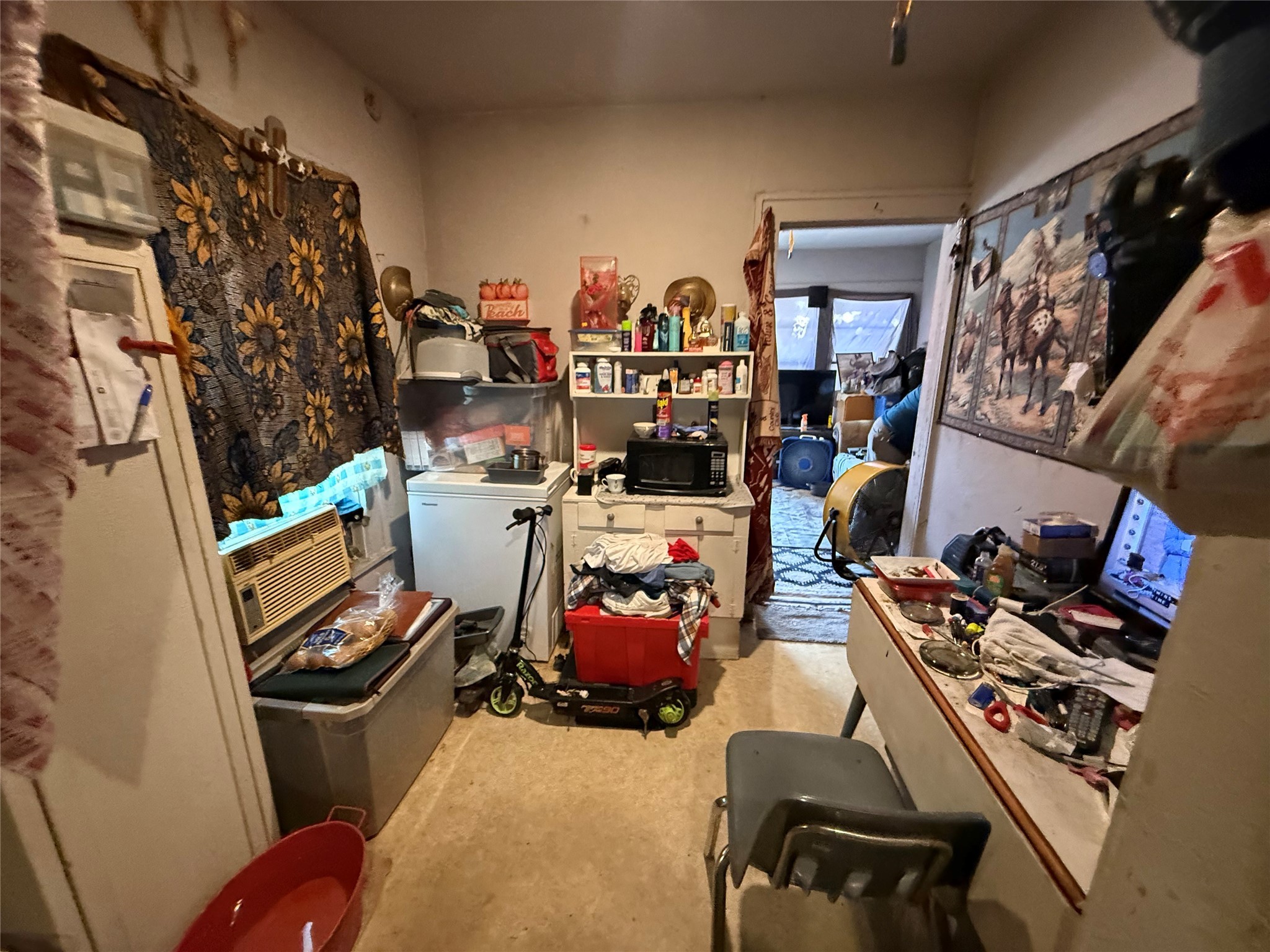 1109 North 67th Street Houston, TX 77011 - Photo 16 of 22 a room with furniture a rug and a fan