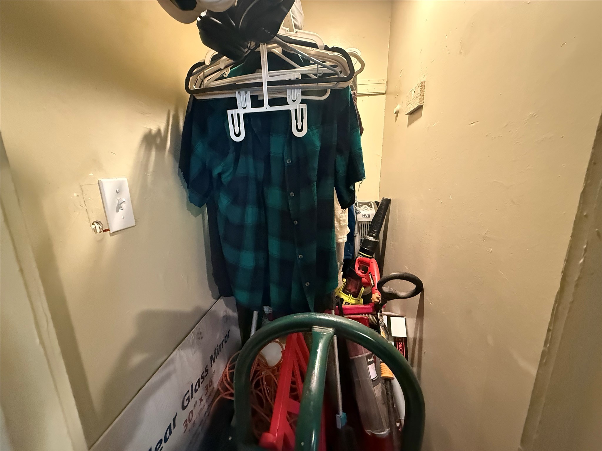 1109 North 67th Street Houston, TX 77011 - Photo 21 of 22 a view of walk in closet with clothes and shoes