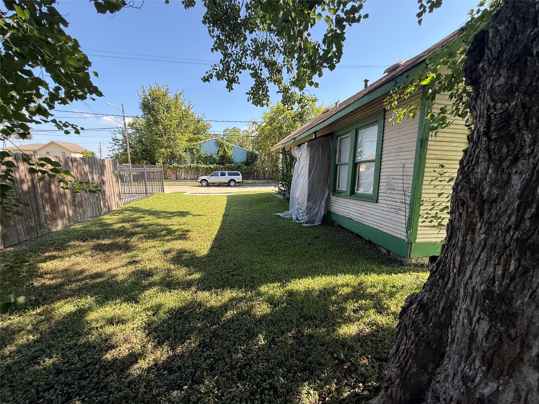 1109 North 67th Street Houston, TX 77011 - Photo 10 of 22 a view of backyard of house