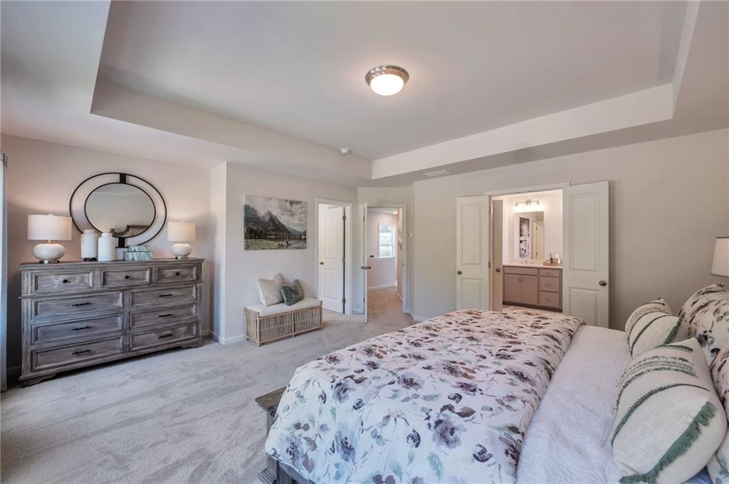 156 Millers Lane Calhoun, GA 30701 - Photo 16 of 26 a bedroom with a bed and a dresser