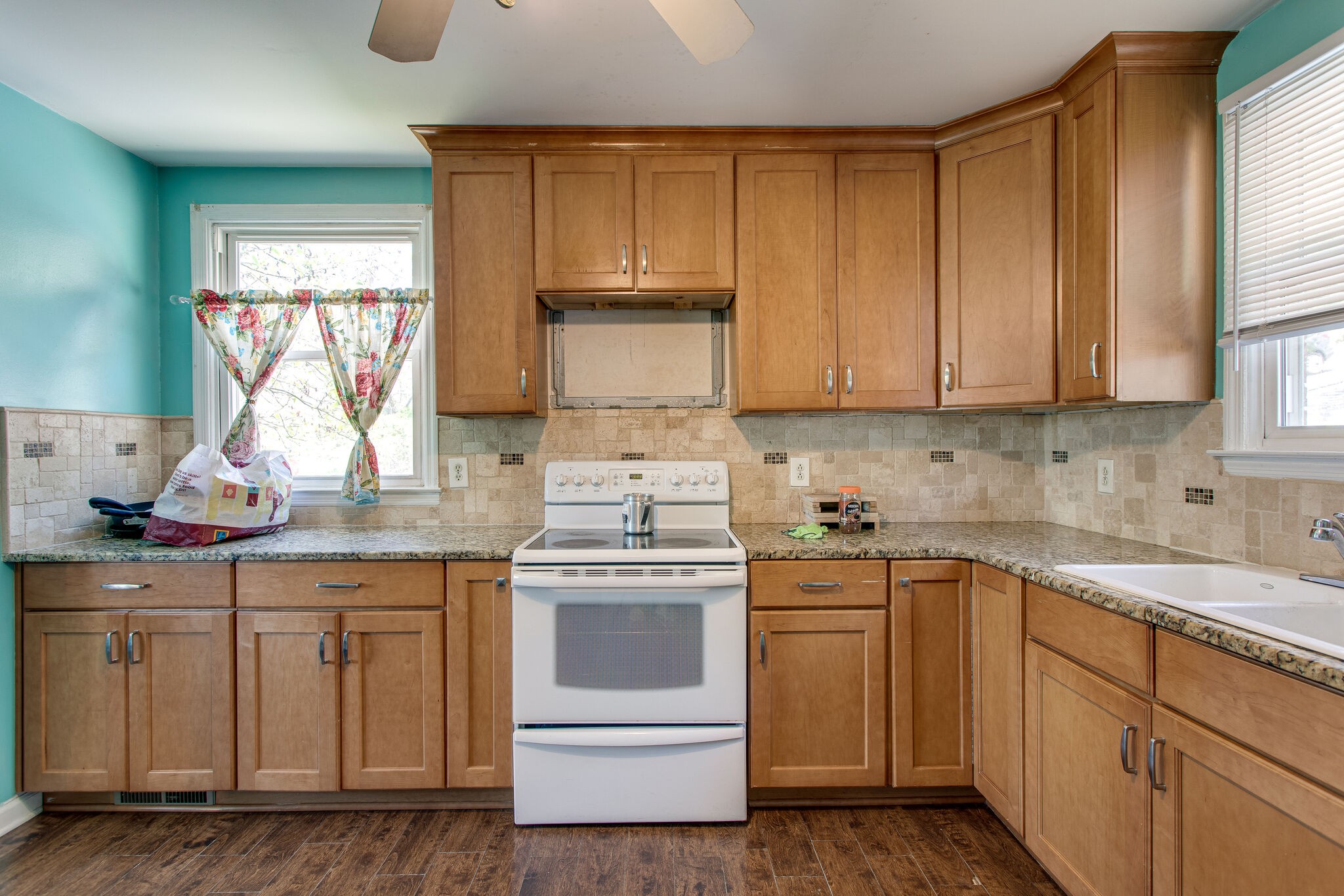 116 Tusculum Road Antioch, TN 37013 - Photo 1 of 27 a kitchen with a sink stove and cabinets