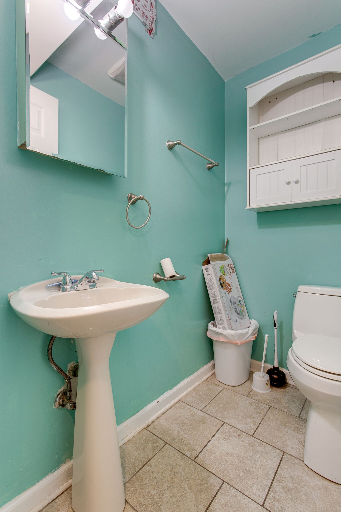 116 Tusculum Road Antioch, TN 37013 - Photo 24 of 27 a bathroom with a sink a toilet and a mirror