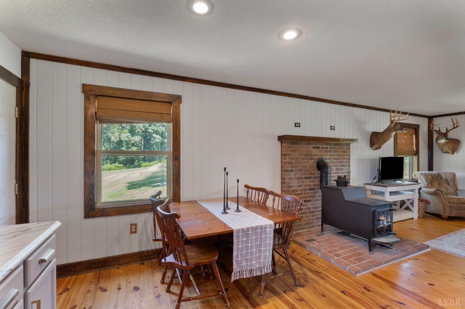 4466 Five Forks Road Pamplin, VA 23958 - Photo 11 of 34 a dining room with furniture and wooden floor