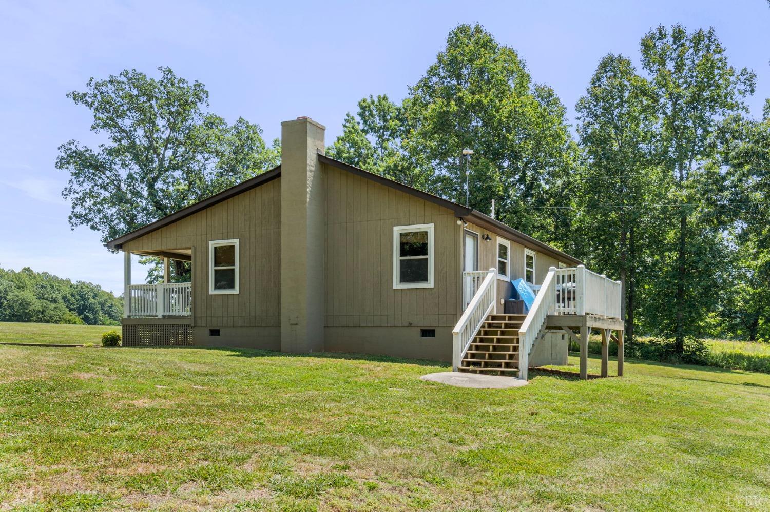 4466 Five Forks Road Pamplin, VA 23958 - Photo 16 of 34 a view of a house with a yard