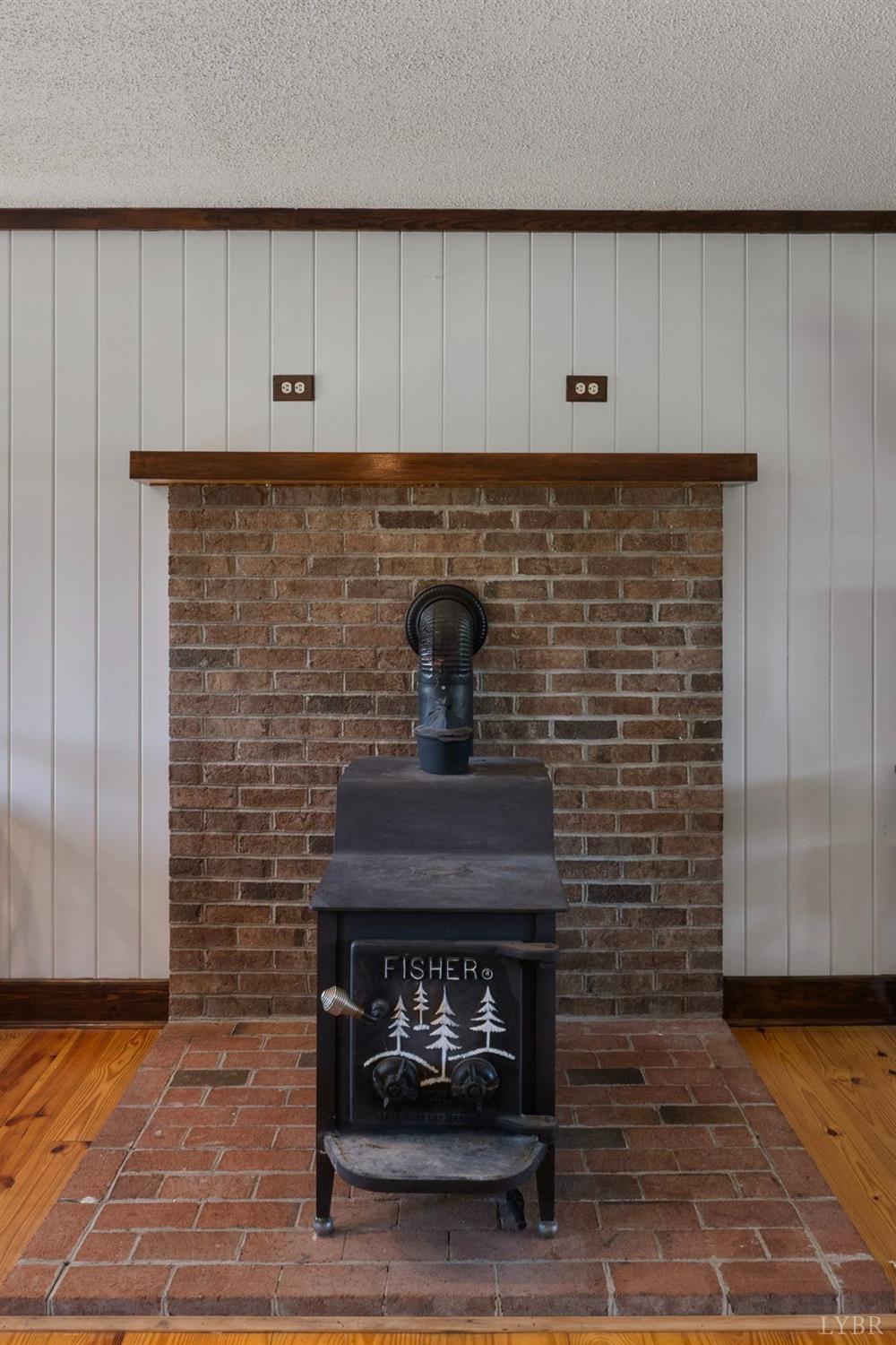 4466 Five Forks Road Pamplin, VA 23958 - Photo 7 of 34 a room with fireplace