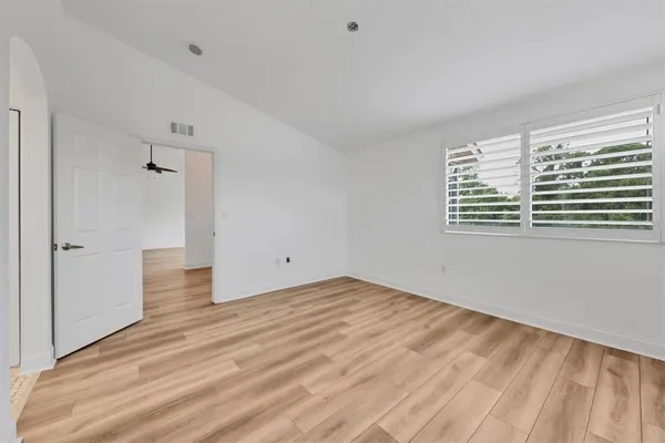 a bathroom with a sink double vanity and a mirror
