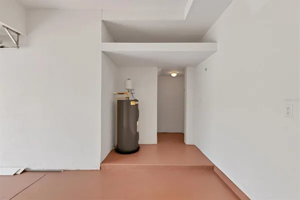 a view of a balcony with a floor to ceiling window and an entrance