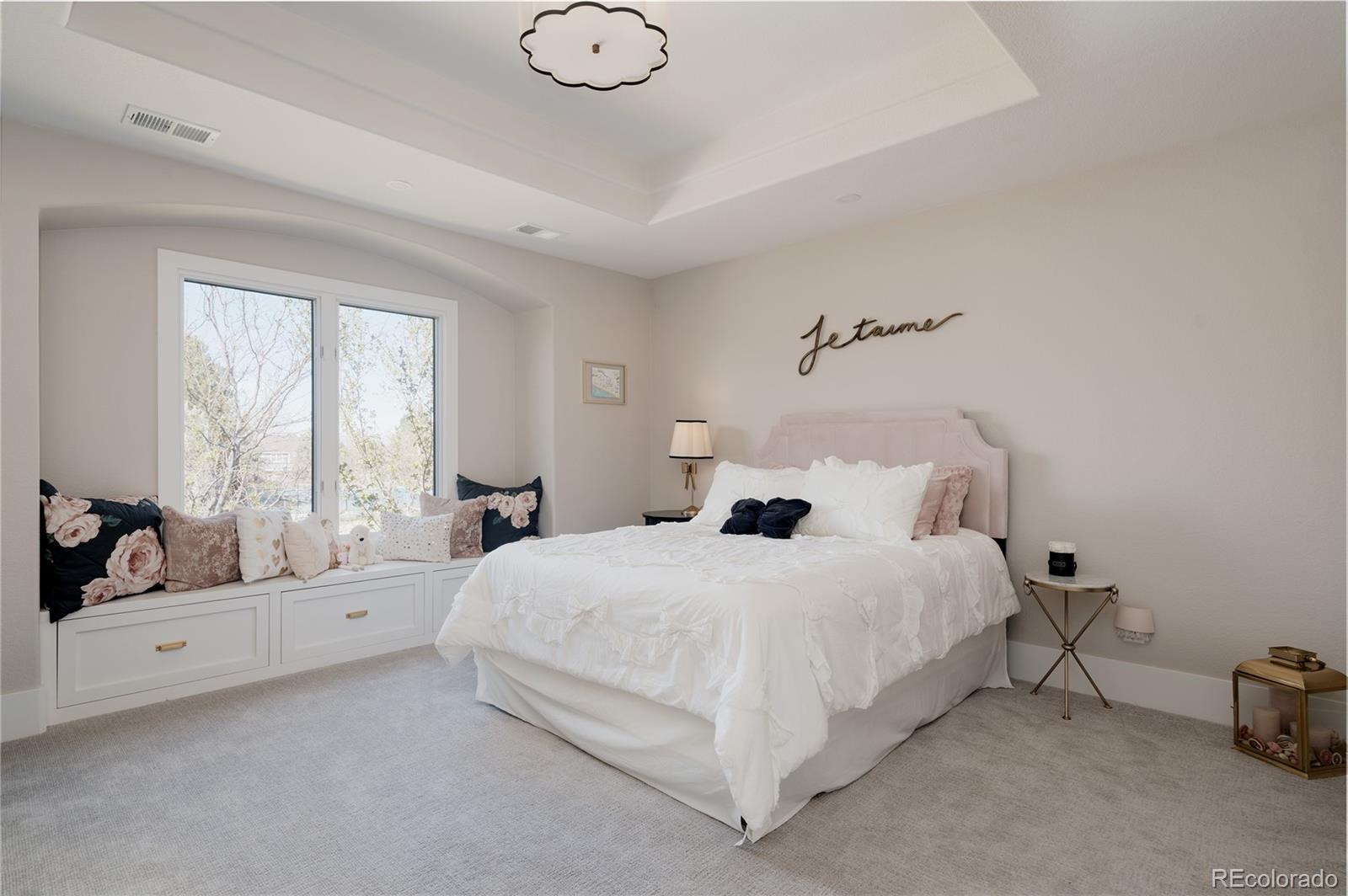 298 Fairchild Drive Highlands Ranch, CO 80126 - Photo 28 of 50 a bedroom with a bed a table and chair