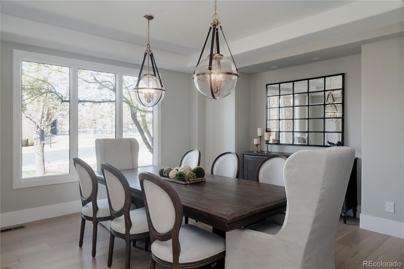 298 Fairchild Drive Highlands Ranch, CO 80126 - Photo 4 of 50 a view of a dining room with furniture window and outside view