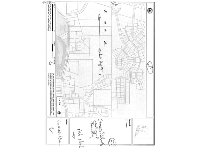 a picture of a bathroom with a shower and a mirror