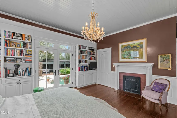 a kitchen with stainless steel appliances kitchen island granite countertop a refrigerator and a sink