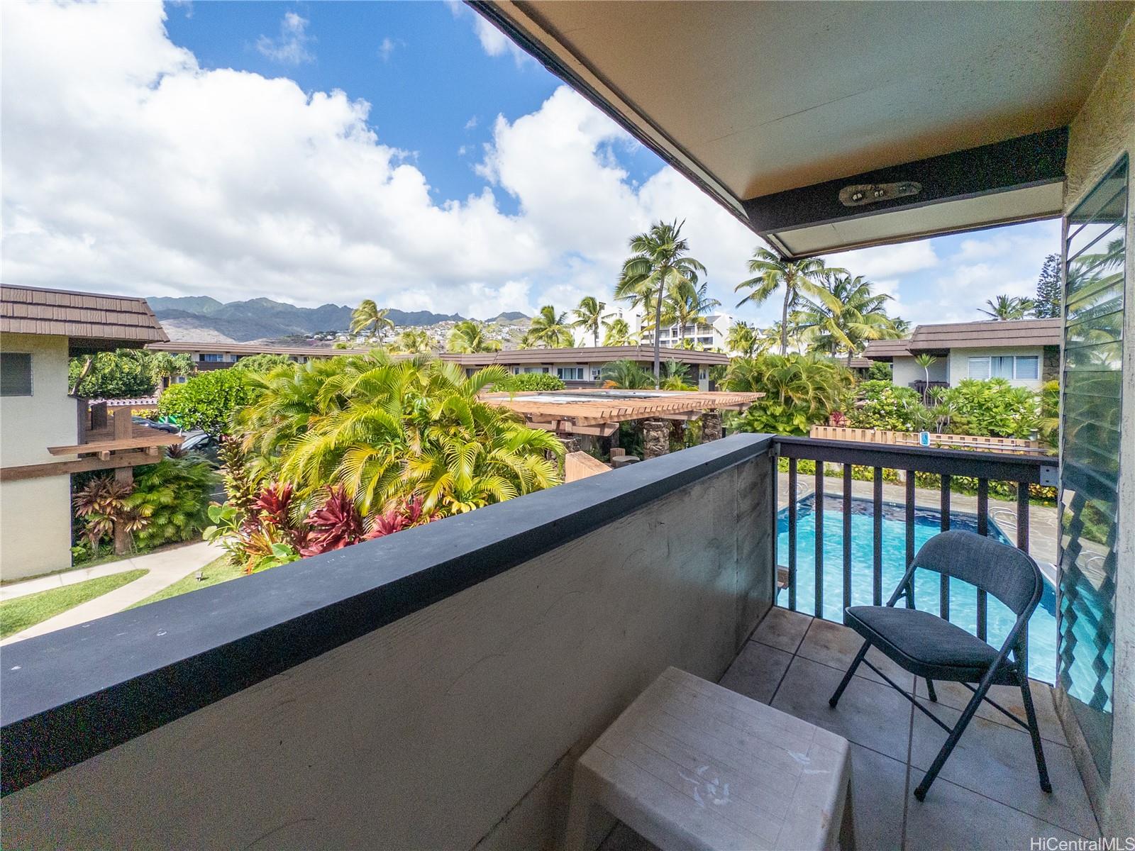 444 Lunalilo Home Road, Unit 506 Honolulu, HI 96825 - Photo 13 of 13 a view of a chairs and table in patio