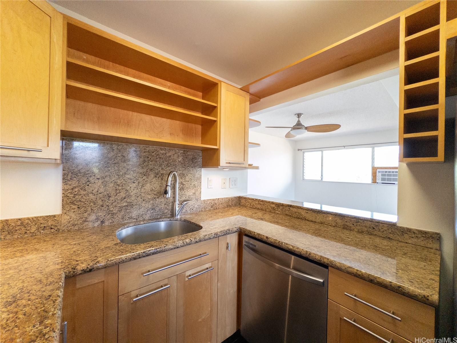 444 Lunalilo Home Road, Unit 506 Honolulu, HI 96825 - Photo 10 of 13 a kitchen with a sink and a window