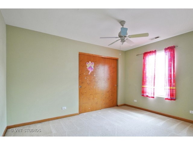 1544 Suncrest Lane Bolingbrook, IL 60490 - Photo 11 of 15 a view of an empty room with a window