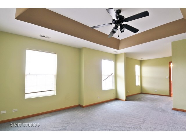 1544 Suncrest Lane Bolingbrook, IL 60490 - Photo 9 of 15 a view of an empty room with a window