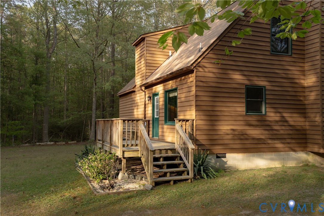 2477 Calno Road Hanover, VA 23069 - Photo 26 of 33 a front view of a house with a yard