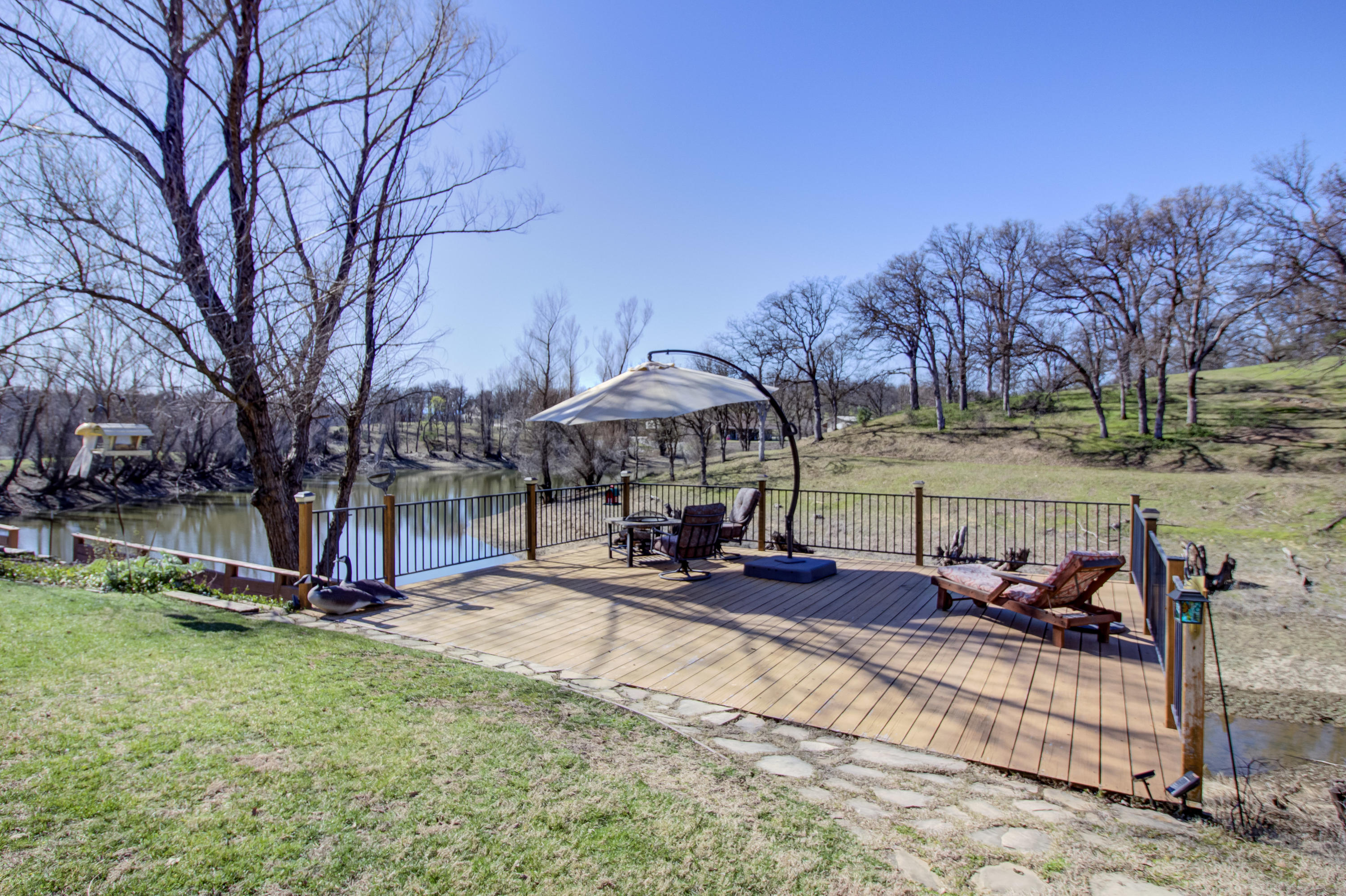 18740 Saddleback Ridge Loop Cottonwood, CA 96022 - Photo 51 of 66 Deck over the water