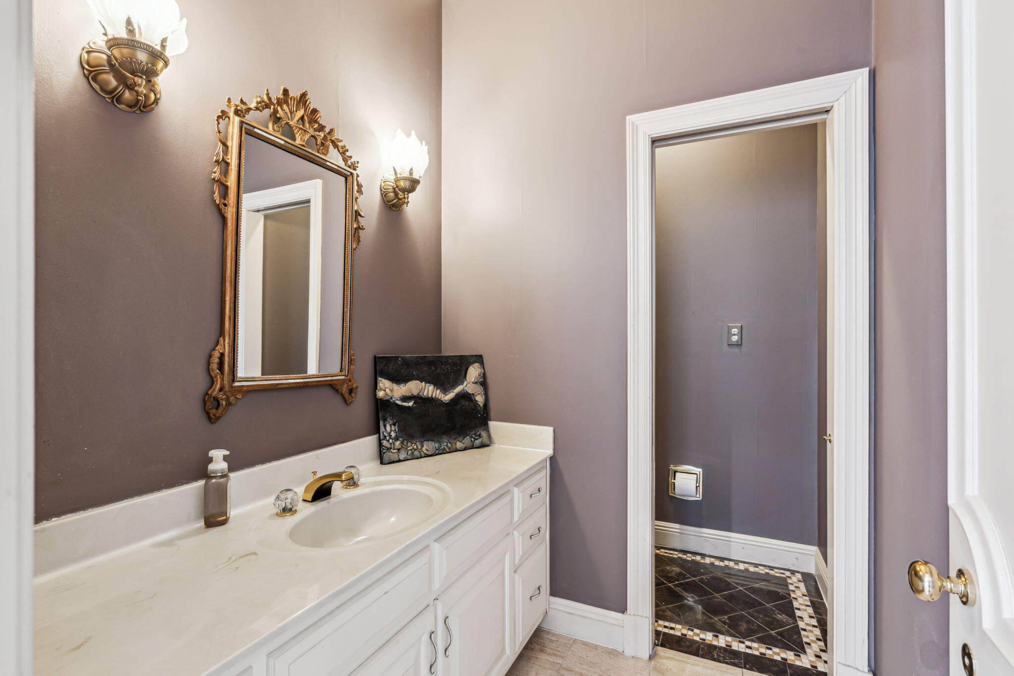 8 Weekewachee Circle Destin, FL 32541 - Photo 17 of 33 a bathroom with a sink and mirror