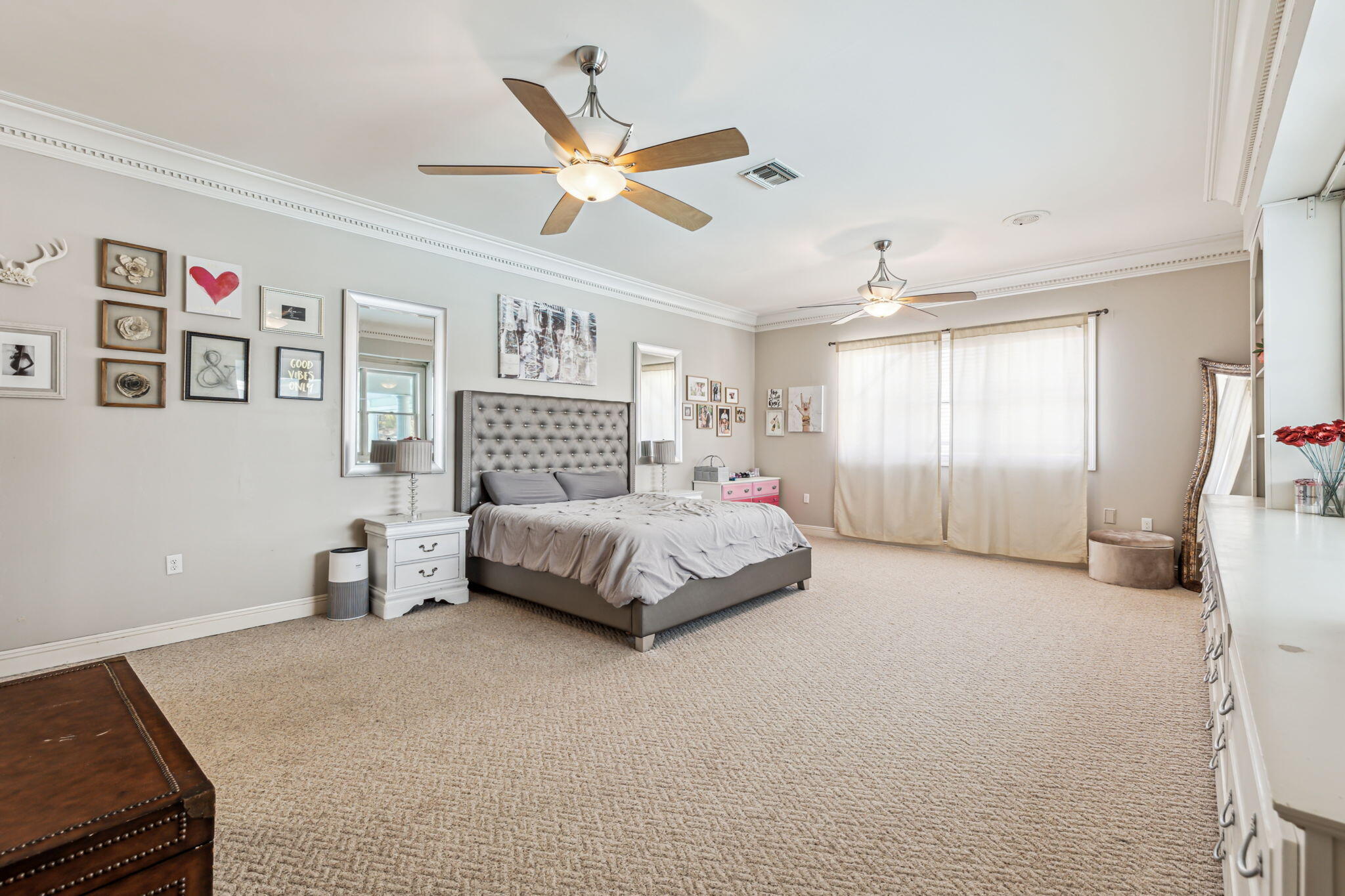 8 Weekewachee Circle Destin, FL 32541 - Photo 18 of 33 a bedroom with a large bed and a chandelier