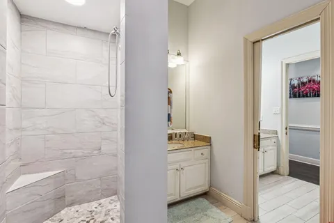 a bedroom with bed and a window